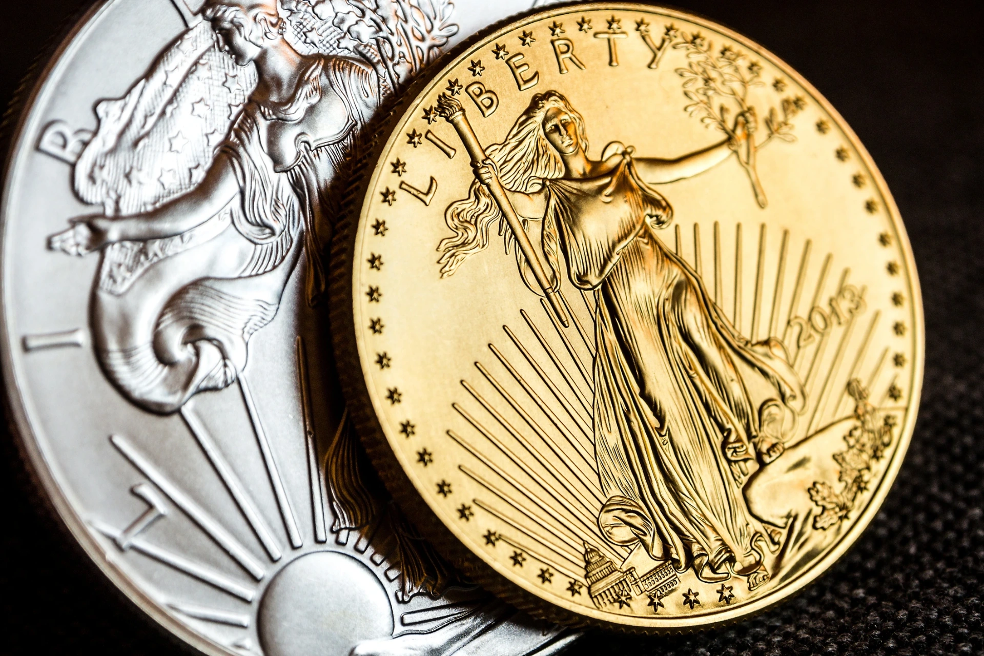 Antique gold coins on velvet